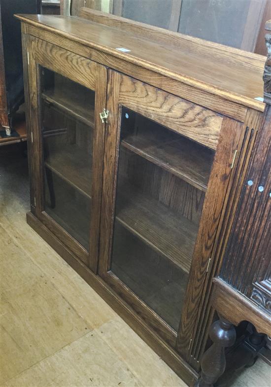 Elm glazed dwarf bookcase(-)